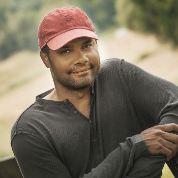 handsome guy with a red hat on vacation