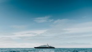 Luxury cruise ship on calm blue ocean