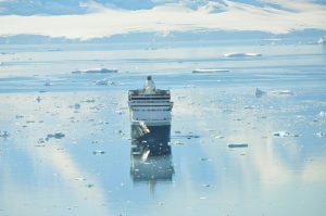 Cruise ship navigating icy Antarctic waters